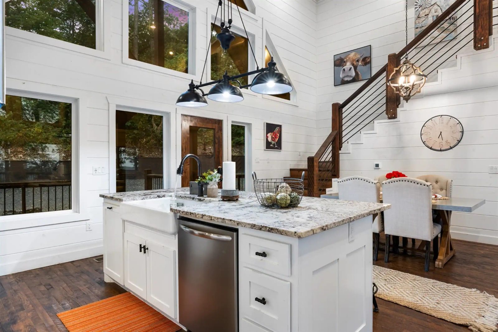 Kitchen and dining, looking toward the stairs.
