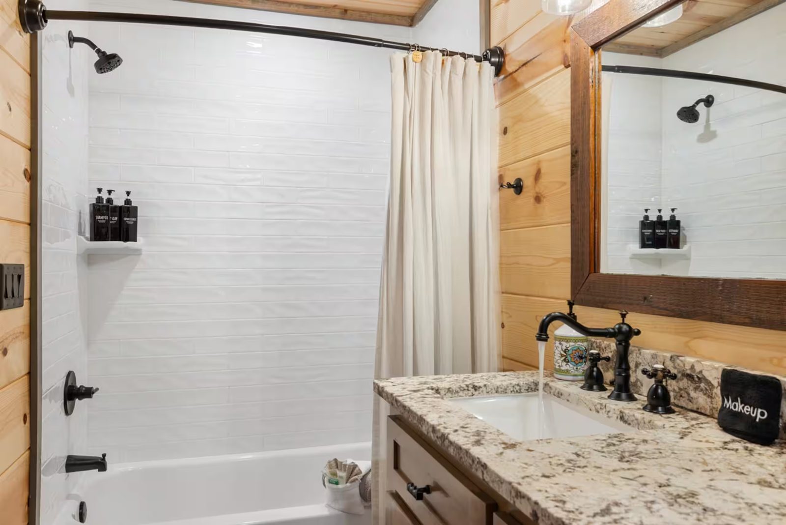 Second bath with a tub and shower.